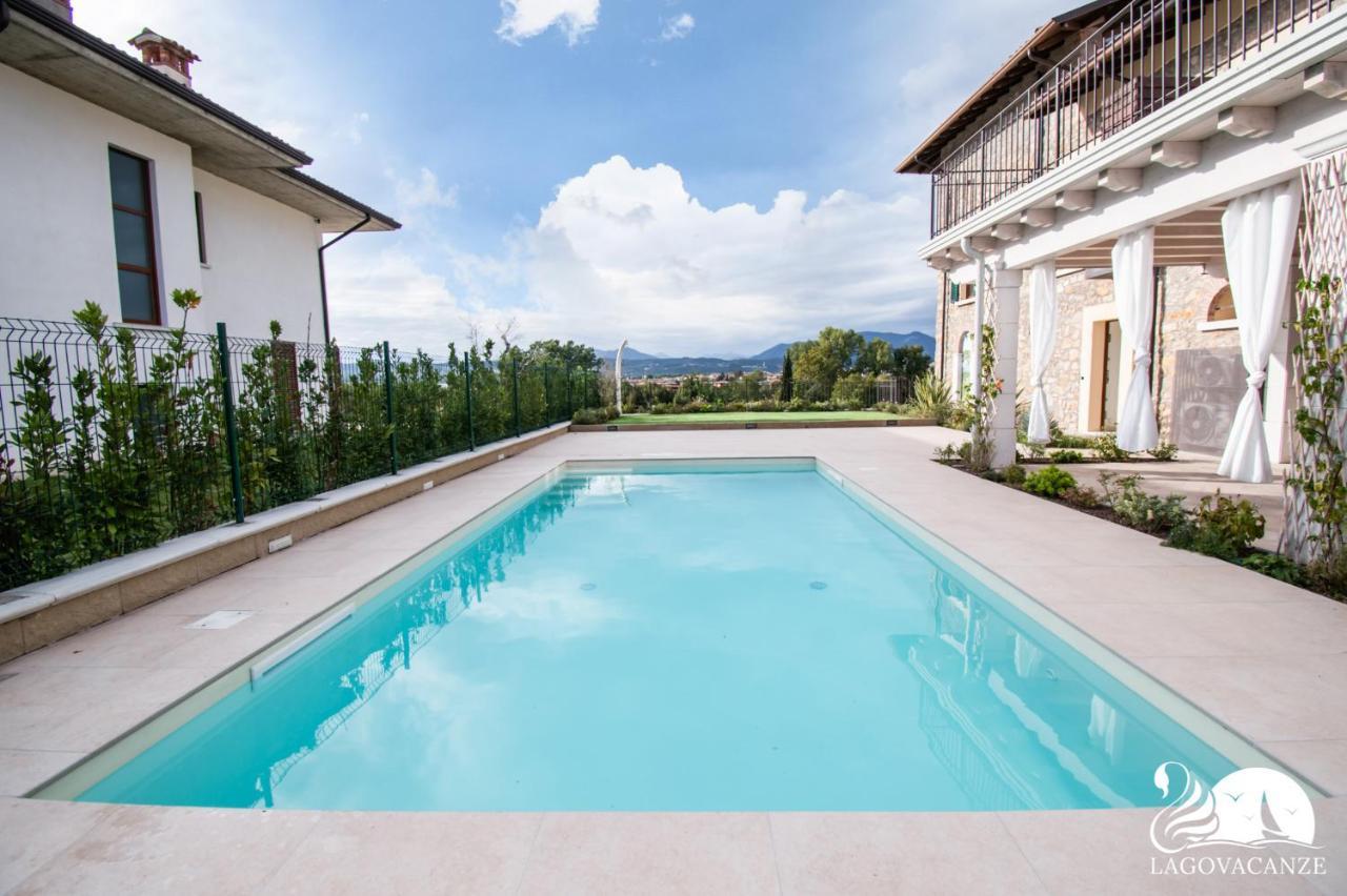 Luxus Gardoncino Apartment มาแนร์บา เดล การ์ดา ภายนอก รูปภาพ